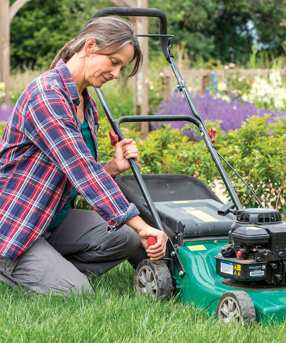 adjusting lawn mower height